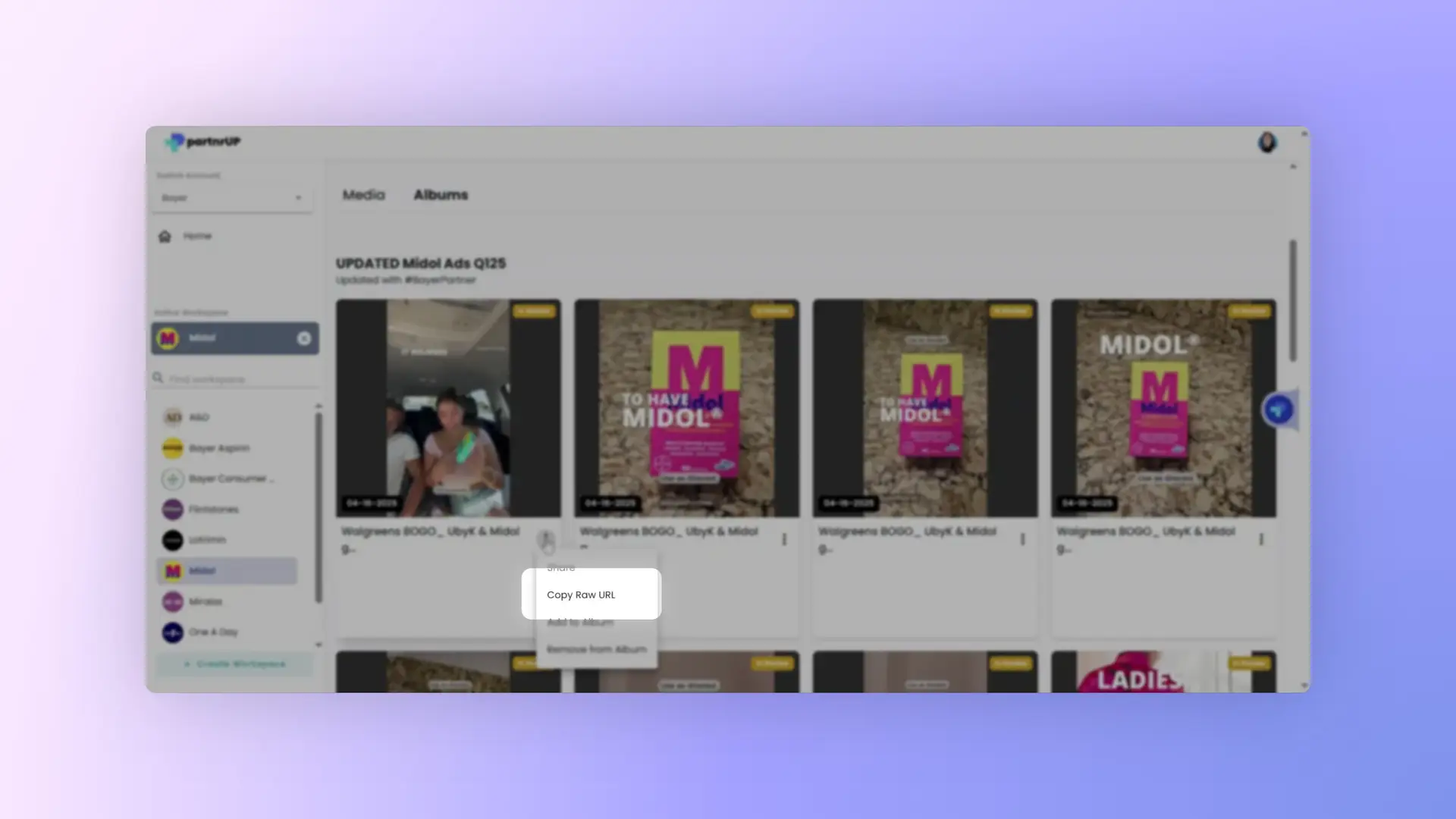 gen.video Albums section showing UPDATED Midol Ads Q125 album with media items in review.
